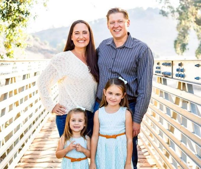 Brandon Stieber with wife and two daughters